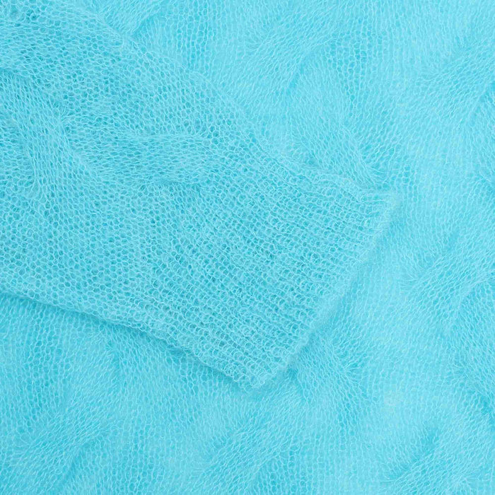 LOOSE KNIT CROSS CABLE